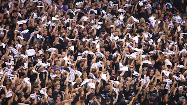 Sep 30, 2023; Fort Worth, Texas, USA; TCU Horned Frogs fans waves towels before the game against the West Virginia Mountaineers at Amon G. Carter Stadium.